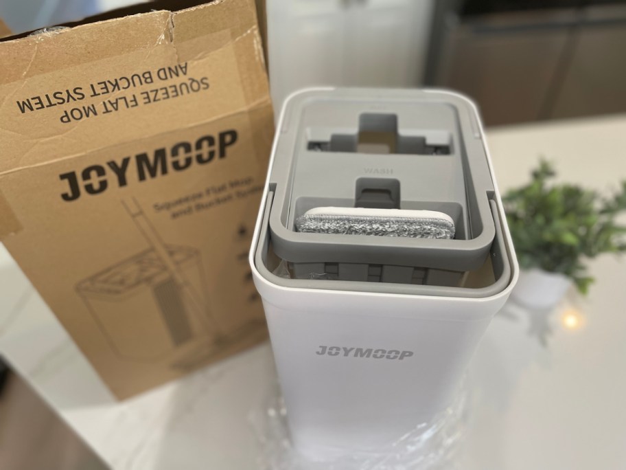 joymoop mop system next to a box