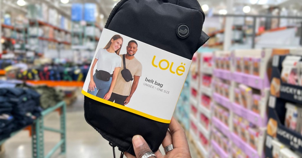 hand holding lole belt bag in costco