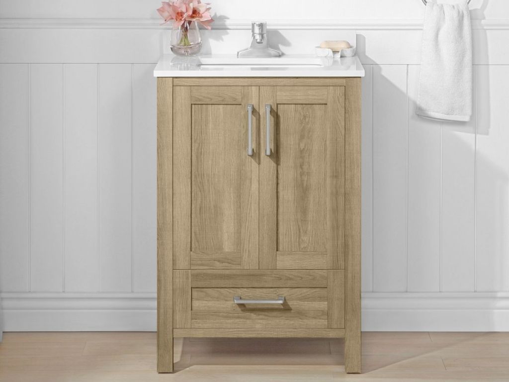 natural wood vanity with white top in bathroom