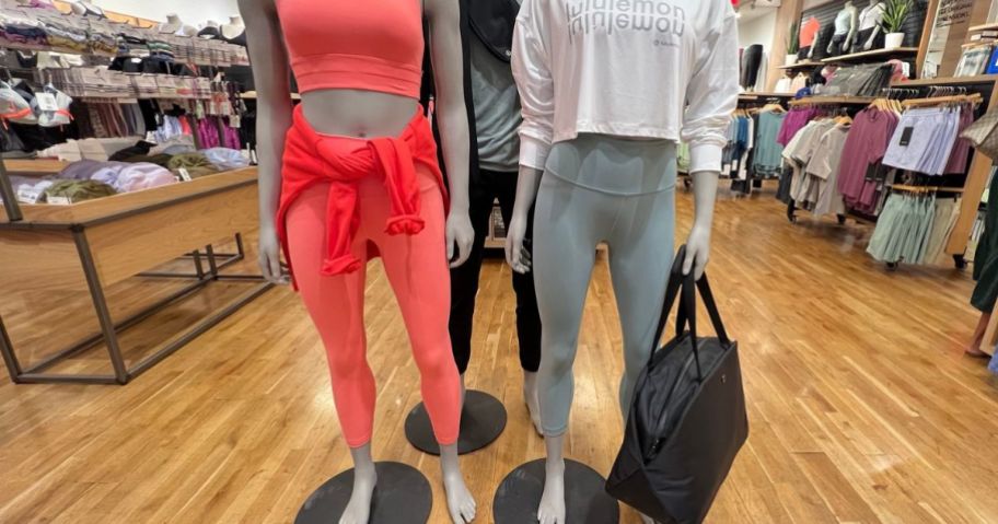 Two mannequins wearing lululemon clothing