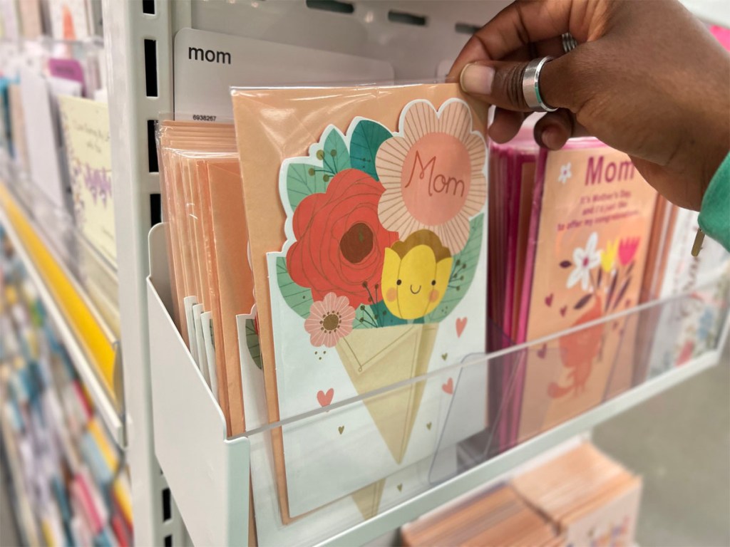 hand holding floral mothers day card in target store