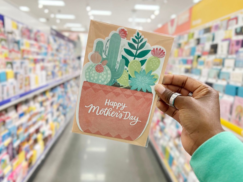 hand holding floral mothers day card in target store