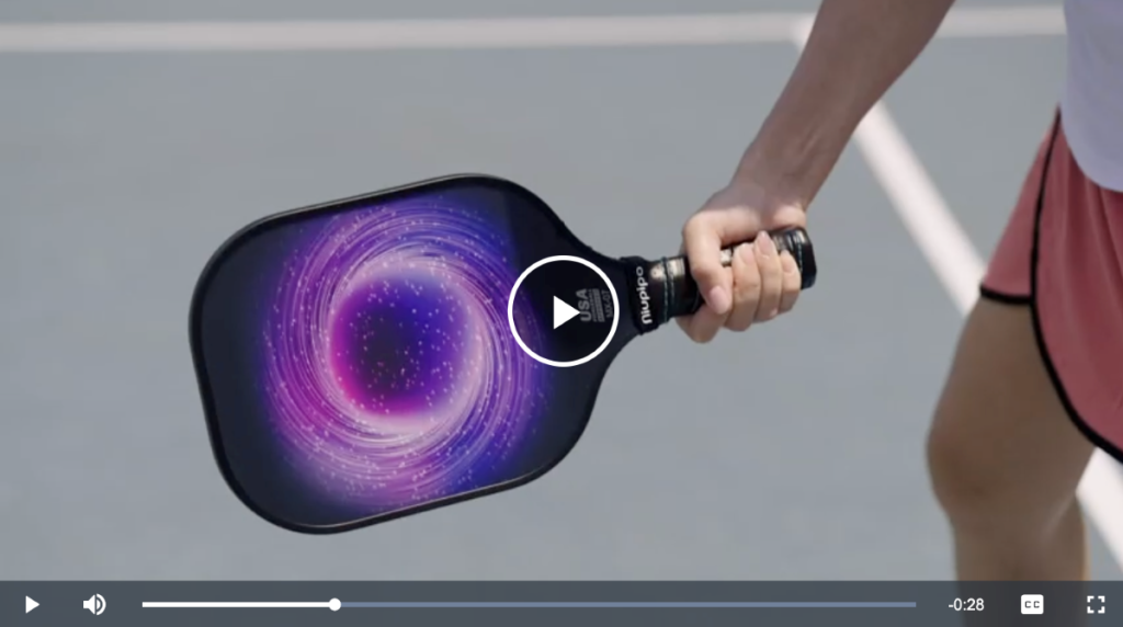 Screenshot of a video of a person using a pickleball paddle