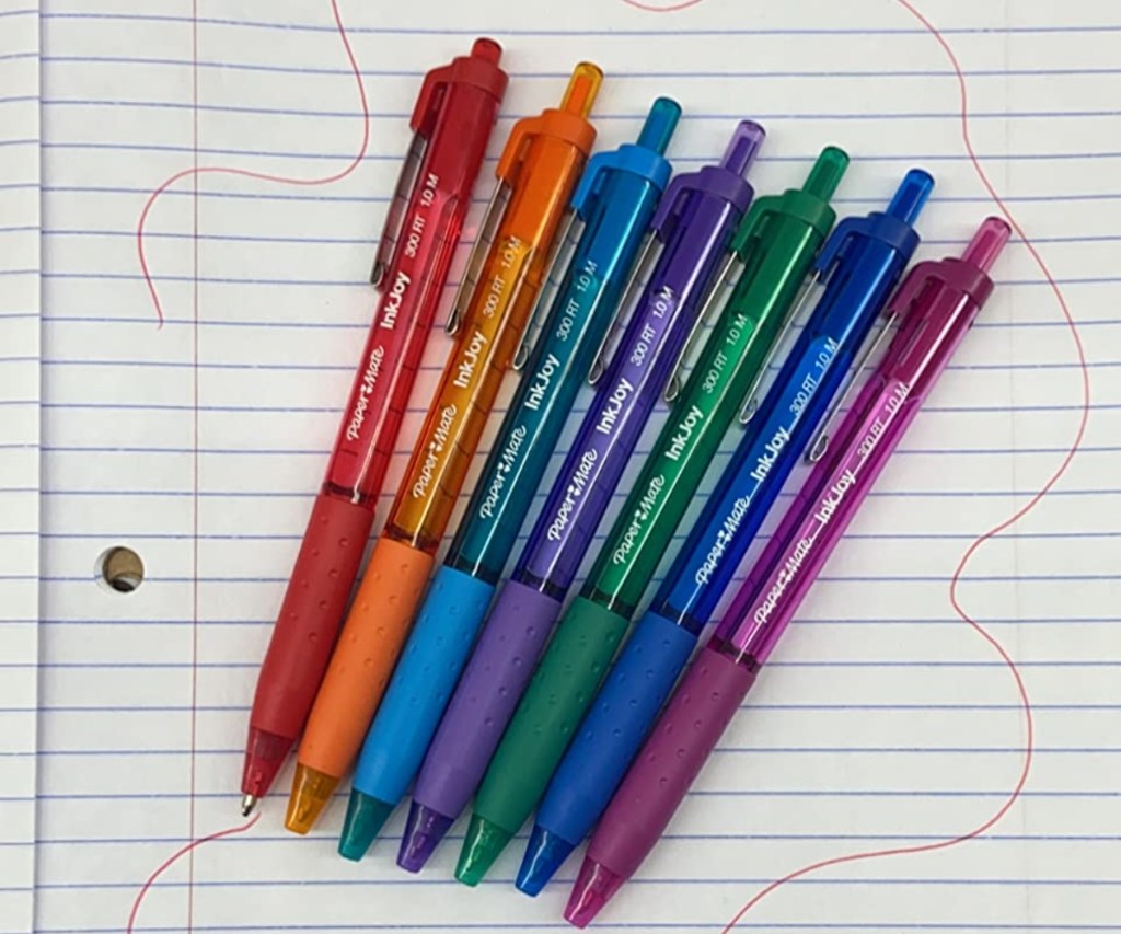 8 multi-color gel pens on notebook paper