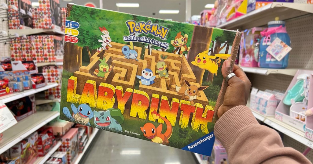 hand holding pokemon labyrinth board game