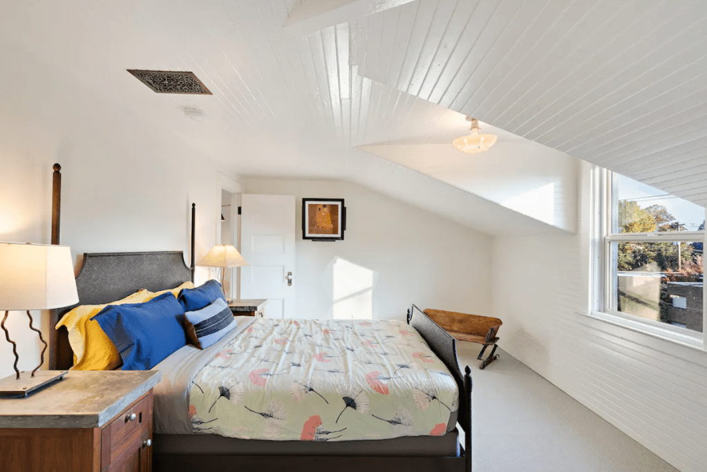 white room with skylight and bed best airbnb locations
