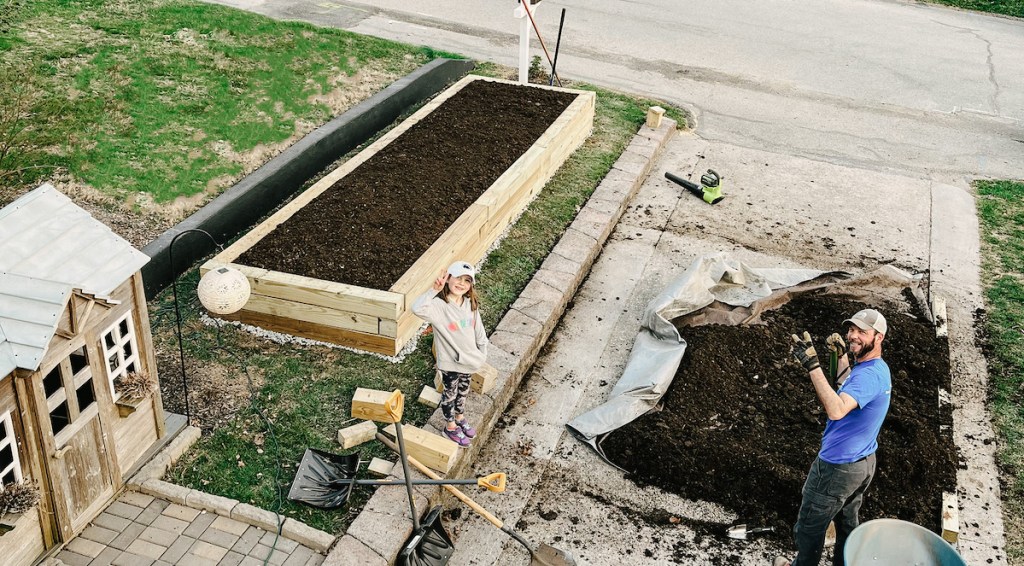 view of large diy garden bed in yard