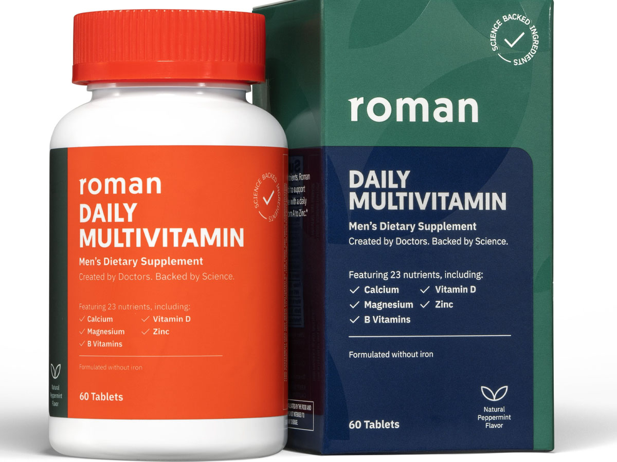 roman daily multivitamin bottle and box stock images