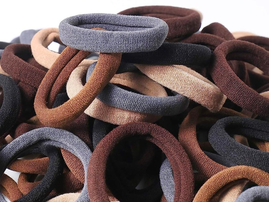 seamless brown, gray, black and beige hairties in a pile