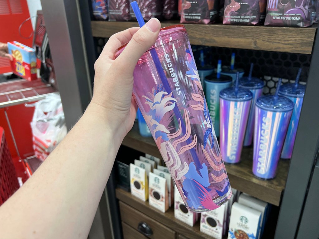 hand with pink flowers tumbler