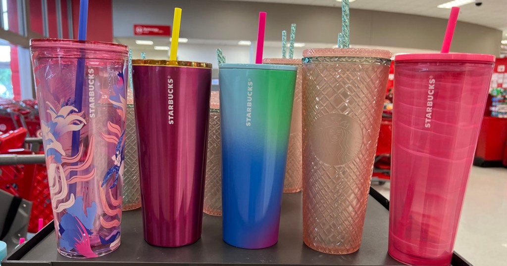 5 starbucks summer cups in a row on the shelf at Target