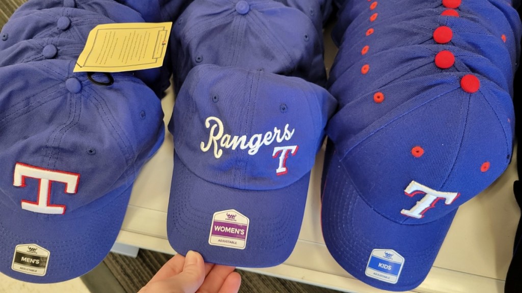 blue Texas Ranger hats on a store shelf
