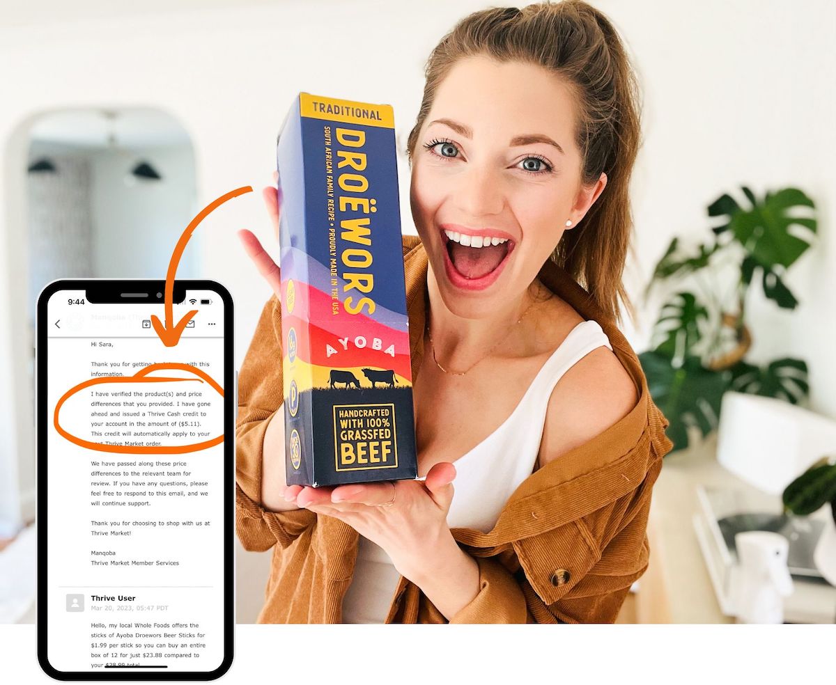 woman holding a box of jerky with phone screenshot of refund email