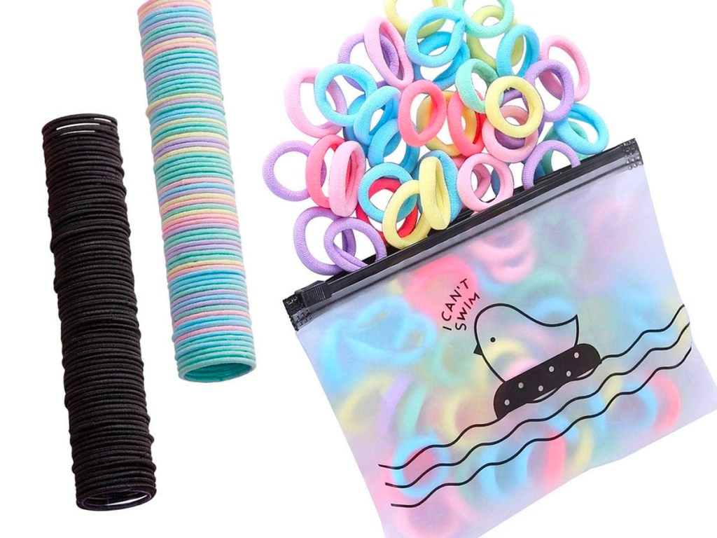 black and colored hairties in a stack and see through bag full of colorful hair ties