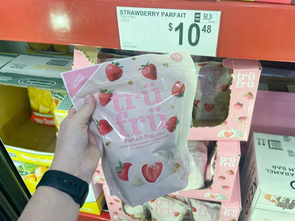 hand holding tru fru strawberry parfaits