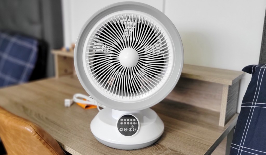 small round fan on desk 