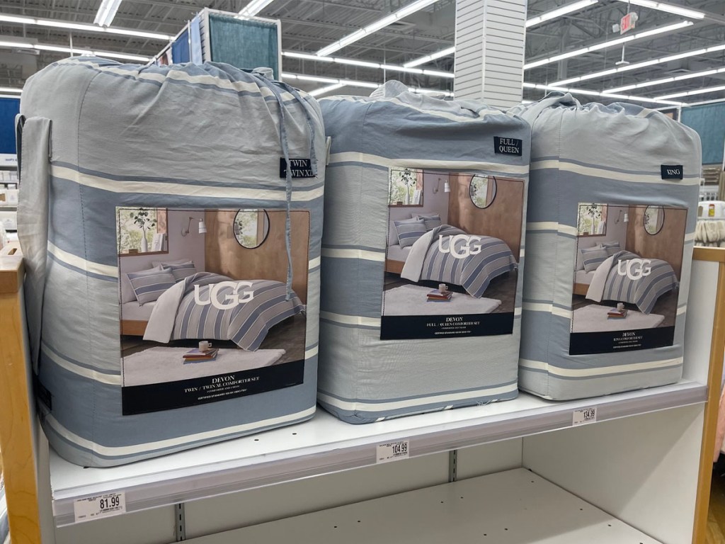 Ugg comforters sitting on shelf