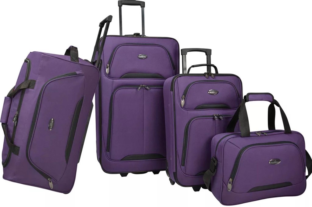 5 piece purple softsided luggage set stock image