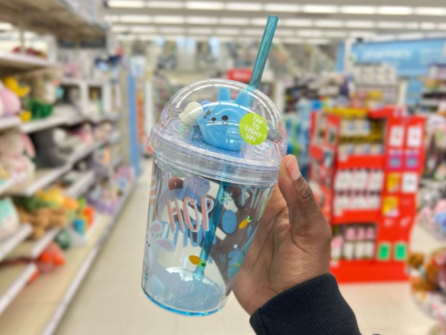 blue Easter Bunny Light Up Dome Cup in person's hand