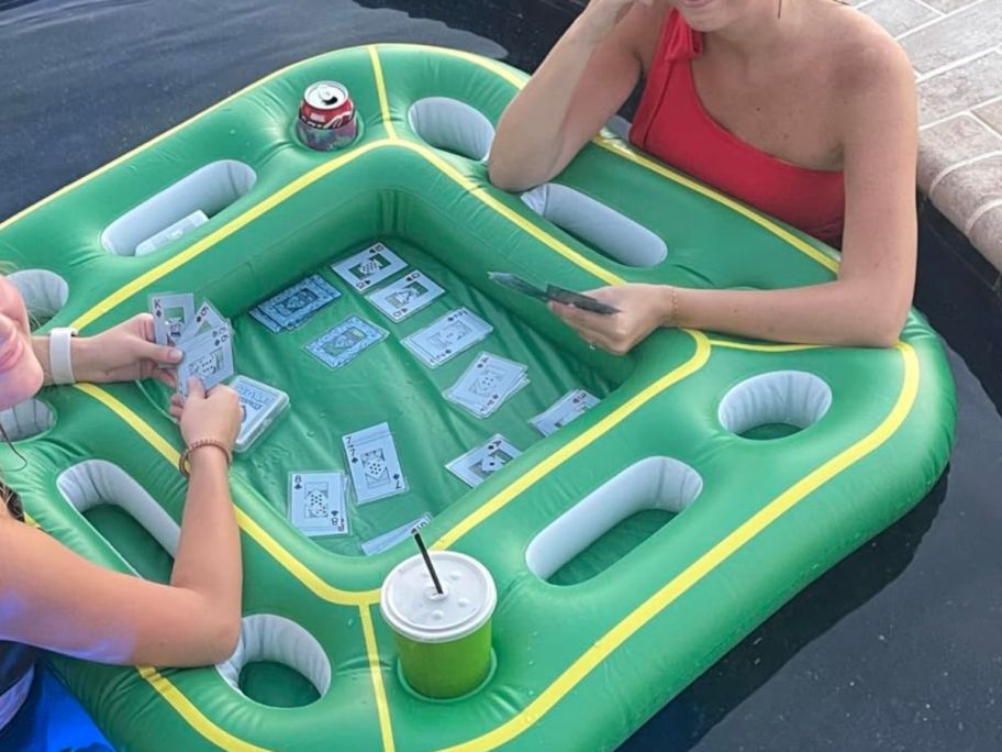 Hoyle Waterproof Playing Cards being played on raft in pool