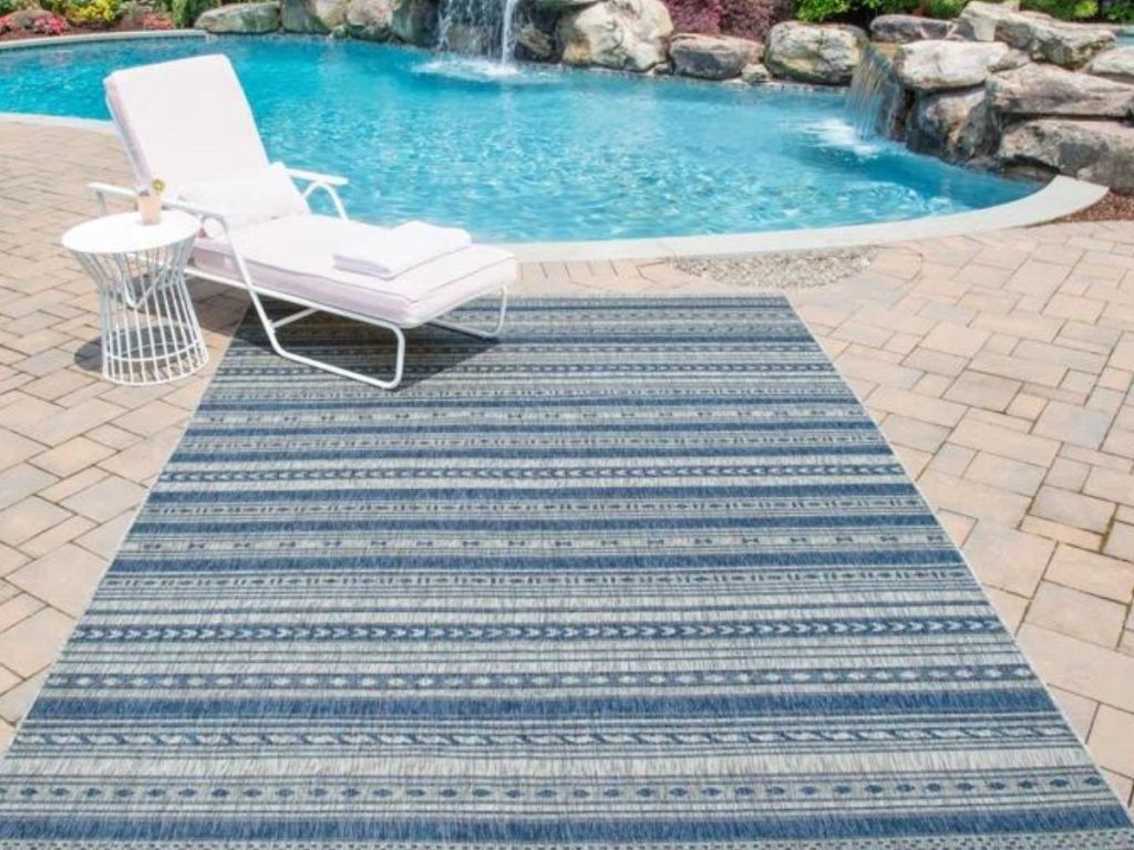Denim Blue patterned rug on patio by pool