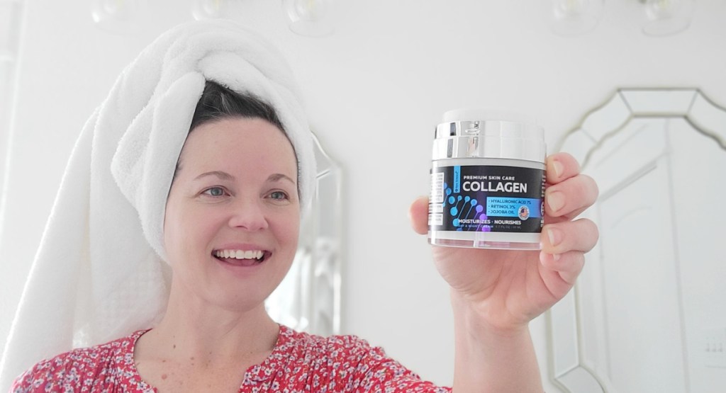woman fresh out the shower holding collagen cream in her hand