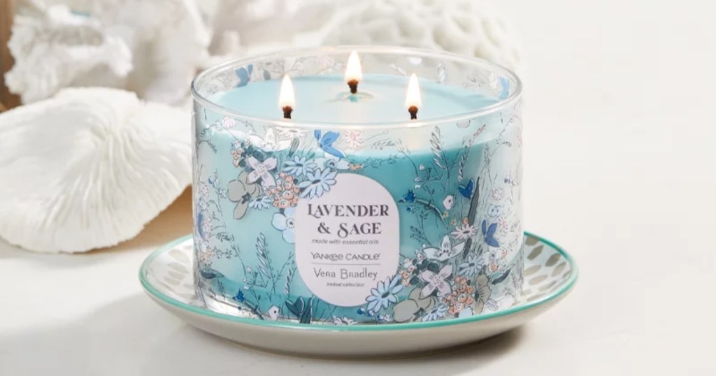blue 3-wick candle with floral label
