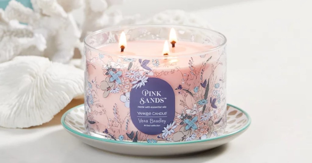 pink 3-wick candle with floral label