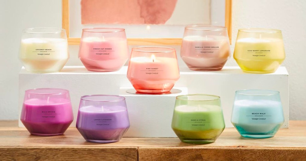 yankee candles in multiple colors on tabletop
