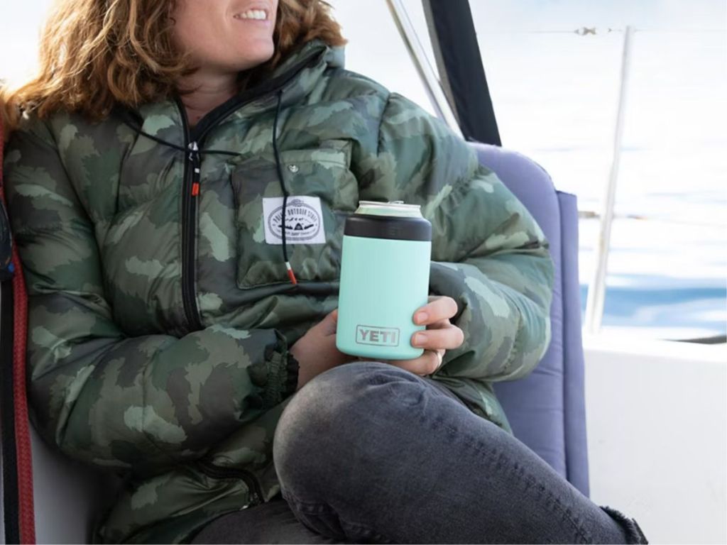 person holding YETI drink holder