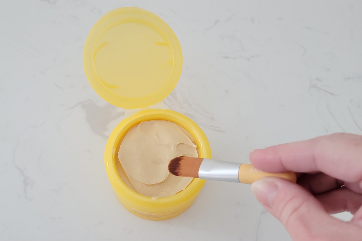 clay mask with brush in it