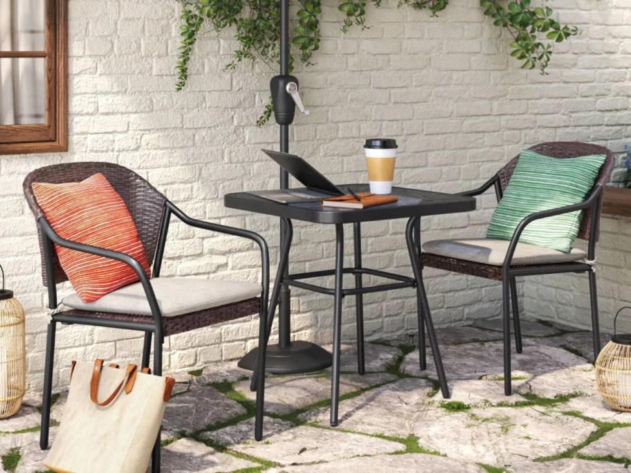 3 piece black wicker outdoor bistro set with cushions and pillows