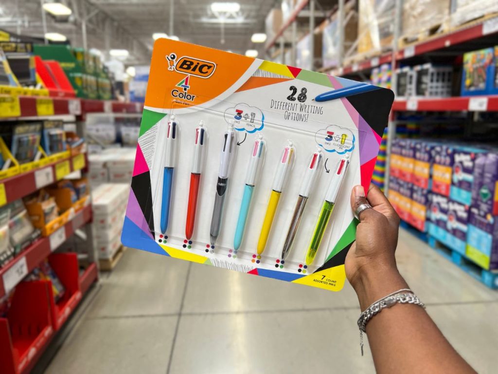 BIC 4-Color Retractable Ballpoint Pen Variety 7-Pack in woman's hand at Sam's Club
