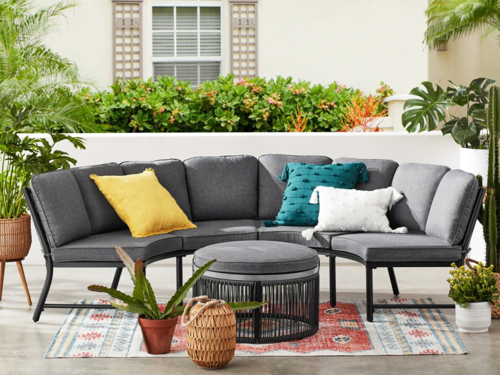 3-Piece Curved Sectional Set displayed in backyard