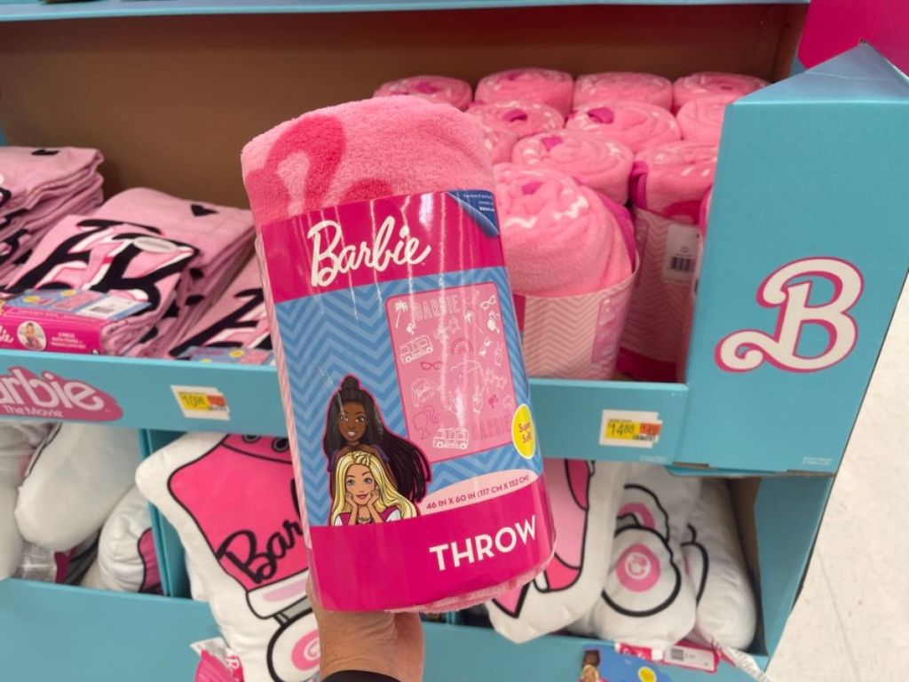 Barbie Throw Blanket in woman's hand at Walmart