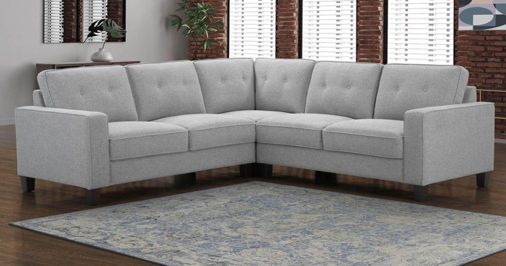 Grey sectional couch in a living room