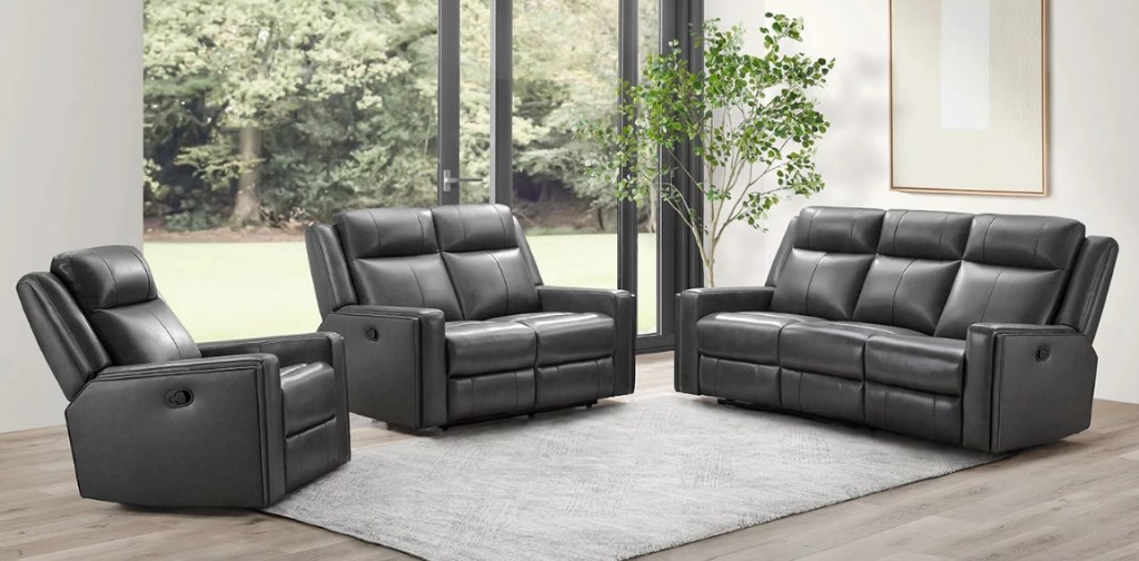 Black leather recliner, loveseat, and couch