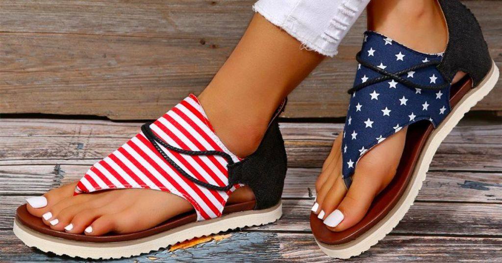 a womans feet wearing a pair od red white & blue sandals from Americana footwear zulily