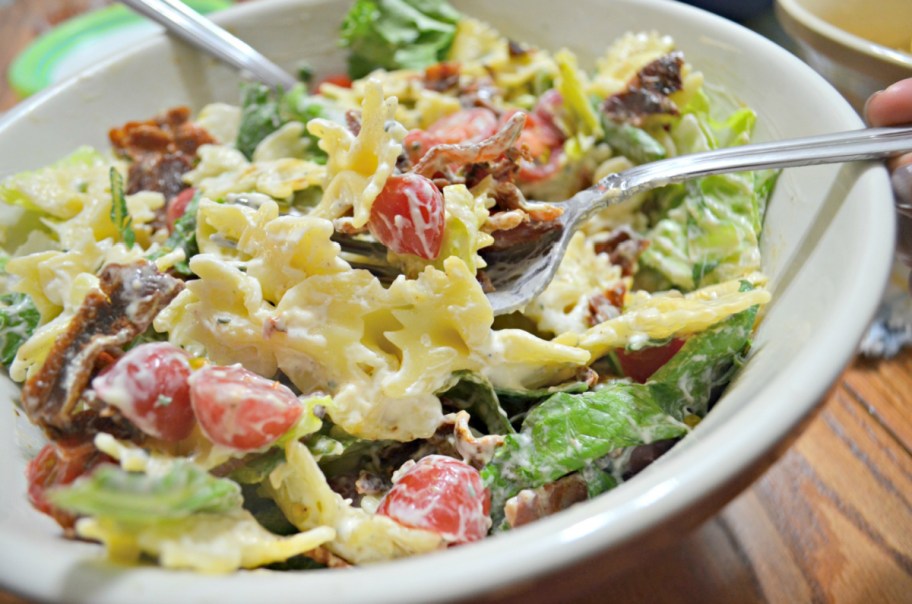 A BLT salad made with bowtie pasta