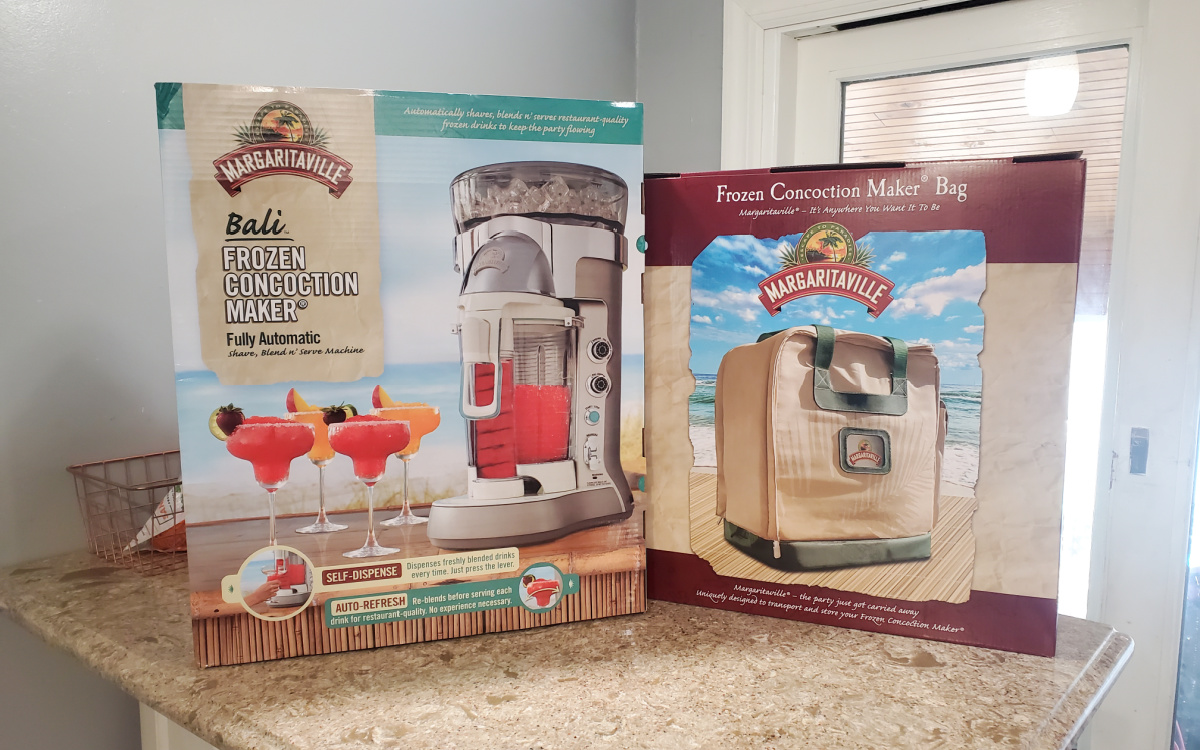 The Bali Frozen Concoction Maker & Carrying Bag from QVC on a kitchen counter