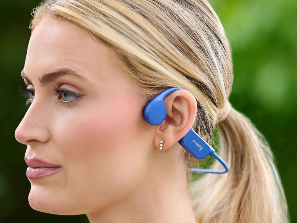 Woman wearing BoneSounds Pro headphones