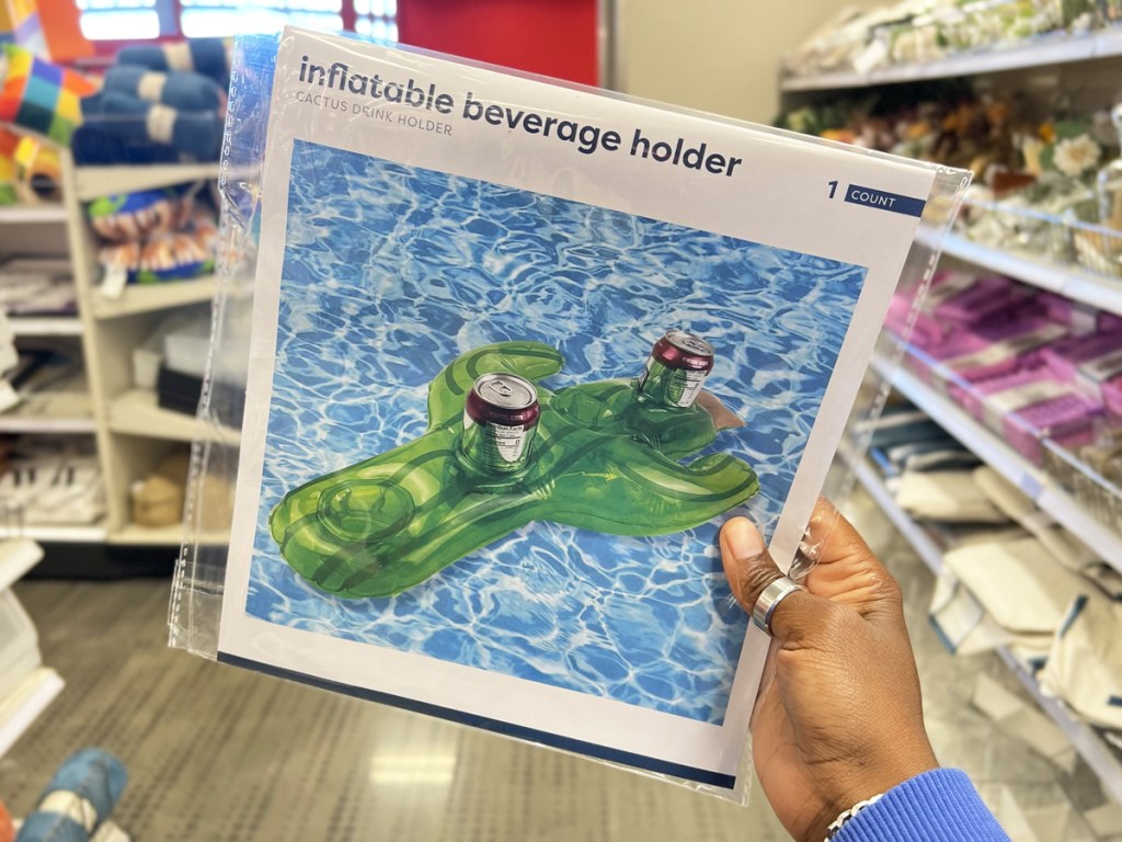 hand holding up a Cactus Inflatable Beverage Holder