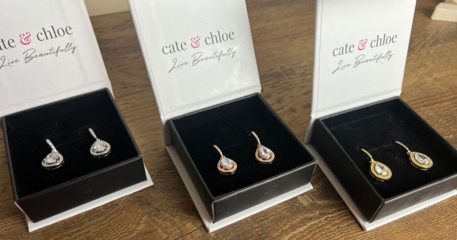 3 pairs of drop earrings in Cate & Chloe jewelry boxes