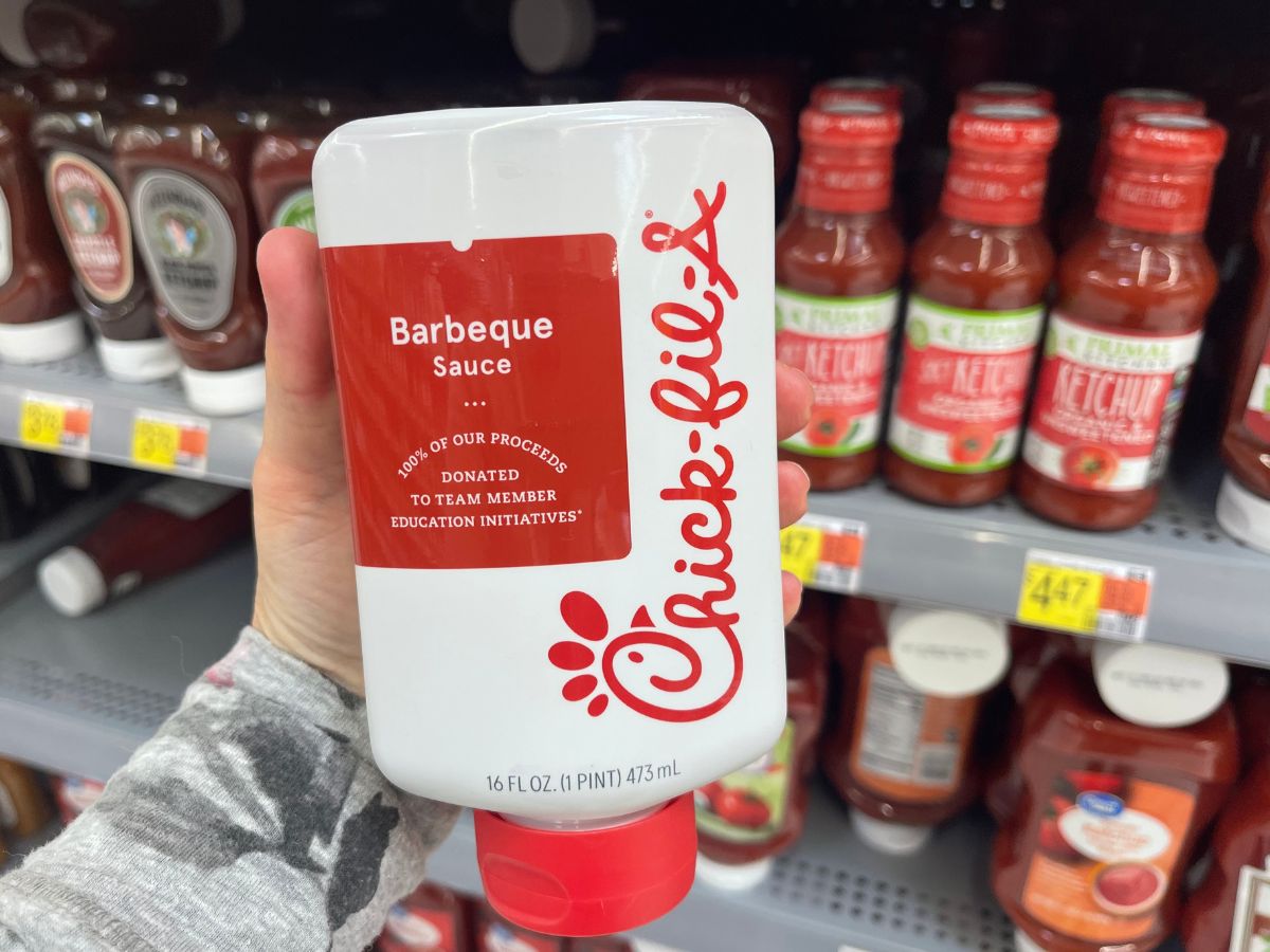 person holding bottle of Chick-fil-A Barbeque sauce