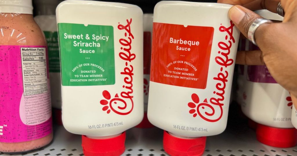Chick-Fil-A Sweet & Spicy Sriracha Sauce and BBQ sauce on shelf in store