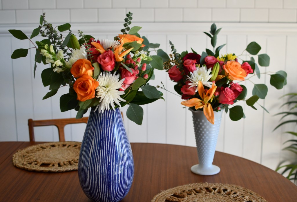 Two DIY grocery store flower bouquets on a table