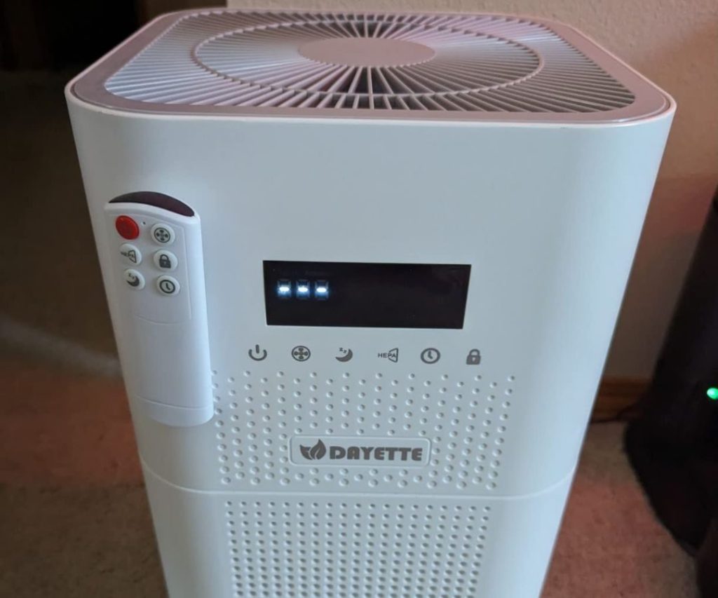 Dayette Air Purifier with remote control attached