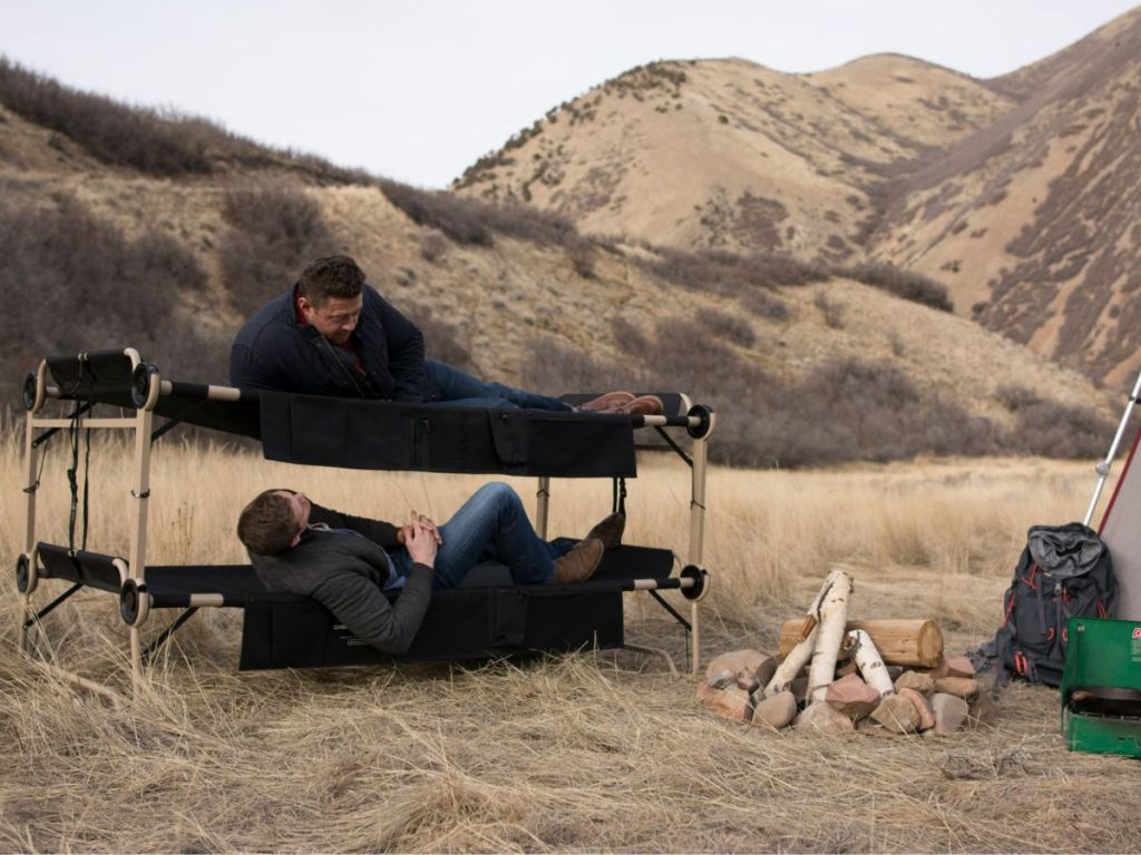 two men camping outdoors with a Disc-O-Bed XL