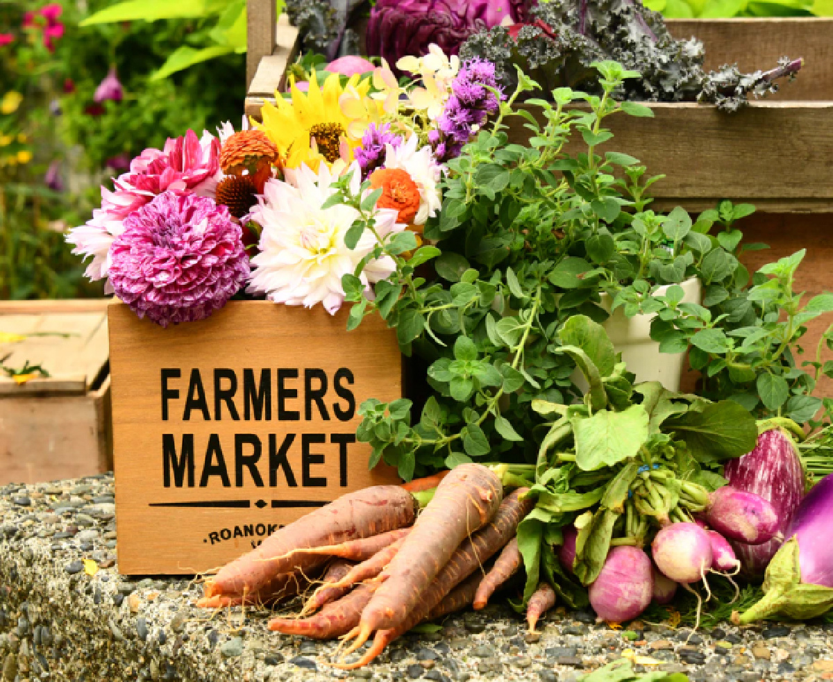 A Farmers Market Crate full of fresh produce and flowers from the Market Wagon Kroger pilot program