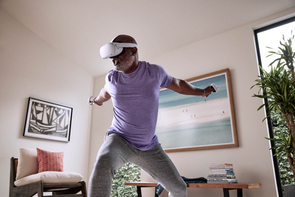 Man doing a workout using the Oculus Quest 2 which is also called Meta Quest 2